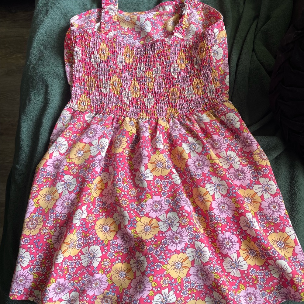 Beautiful summer skort jumper in new condition, size large.